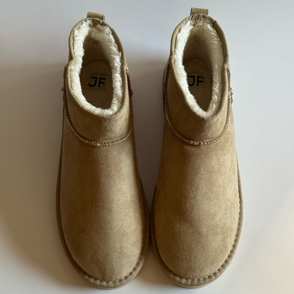 Fuzzy Boots. Brand new. Size US 10 / EU 41